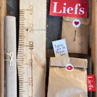 verpakking geboortebord geboorteschilderij Liefslabel uniek origineel kraamcadeau